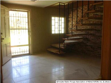 Entrance foyer with marble floors