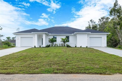 View of front of property featuring a front yard,