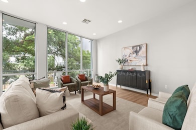 Living room featuring light wood finished floors,