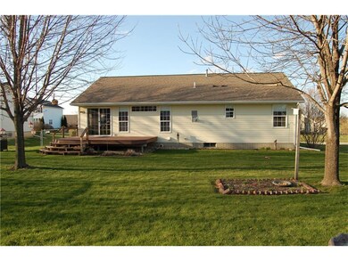 Beautiful back yard with mature trees, perennials 