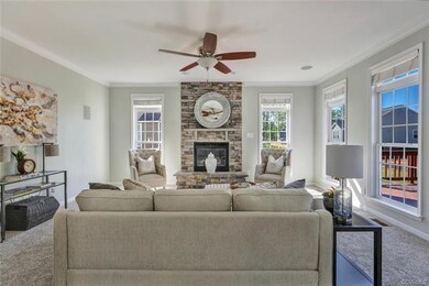 Spacious family room featuring: stacked stone gas 
