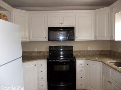 Kitchen w Micro-wave & Granite Counter Tops