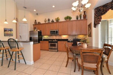 Kitchen with ample cabinets & counter workspace!  