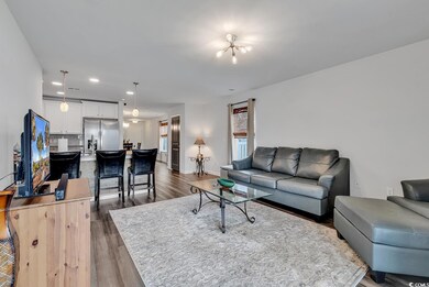 Living room featuring dark hardwood / wood-style f