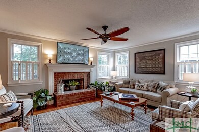 Large living room with tons of windows letting in