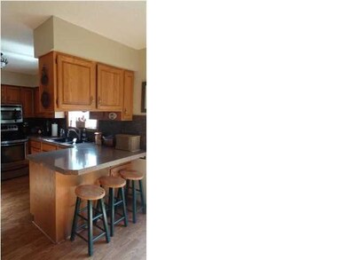 There is additional bar type seating in the kitche