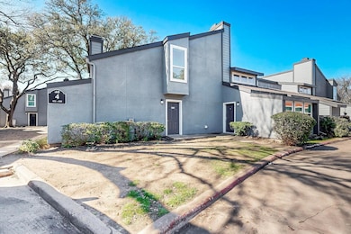 View of home's exterior featuring stucco siding an