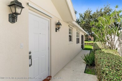 02_7854PineIslandWay_301_Entrance_Custom