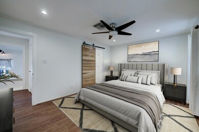 Large Primary Suite with lots of natural light. Vi