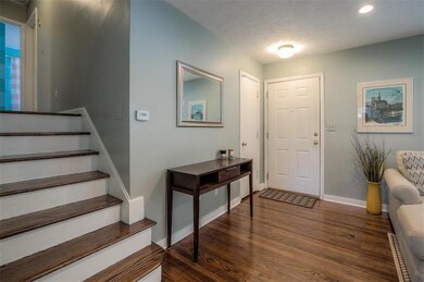 Beautifully refinished hardwoods throughout this h