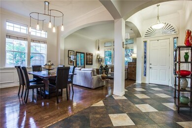 Front entry leads into the formal living and dinin