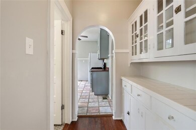 Built-ins for added storage, Kitchen straight ahead and Bathroom on the left.