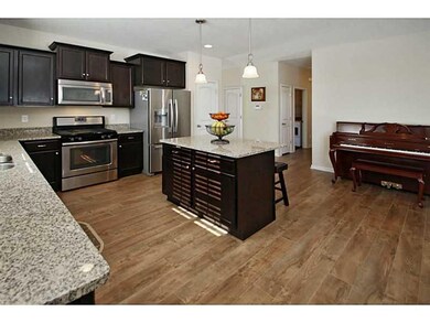 Kitchen. A cooks kitchen with plenty of prep space and wonderful granite counter tops.