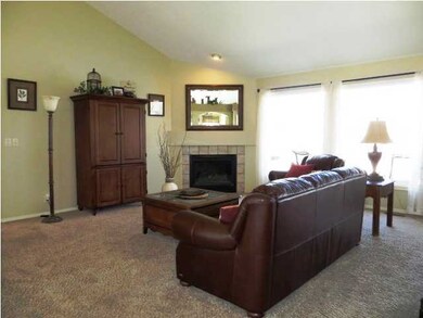 Living room offers great windows overlooking the f