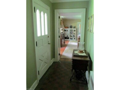 Front door with view into living room.