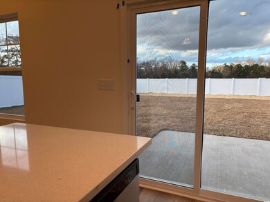 Doorway to outside with light hardwood / wood-styl