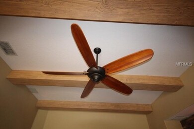 Wood beam ceilings in family room