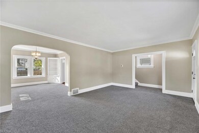 another view of the living room flowing into dining room