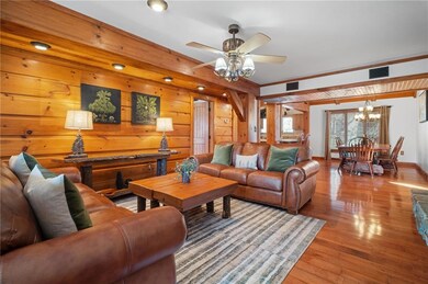 Great room with hardwood, plenty of light, and bea