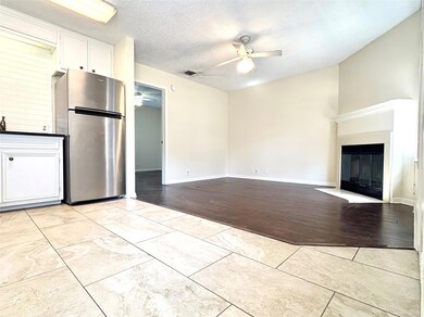 Unfurnished living room with visible vents, a cei