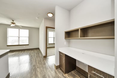 Photos are not of actual units, similar floor plan finishes, verify dimensions