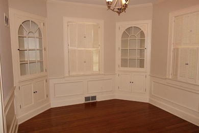 The dining room has so much charm with the wooden 