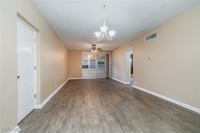 Unfurnished dining area with hardwood / wood-style