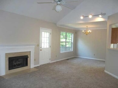 OPEN LIVING ROOM/DINING ROOM COMBO OPENS TO SPACIOUS DECK OVERLOOKING PRIVATE BACK YARD. LIVING ROOM HAS BEAUTIFUL FIREPLACE.