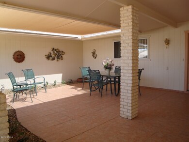 NICE LARGE TILED FRONT PATIO