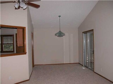 Formal dining rooms with sliding door out onto the