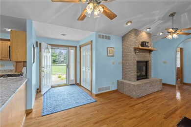 ENTER INTO THE ENORMOUS GREAT ROOM FROM THE SPACIOUS FOYER