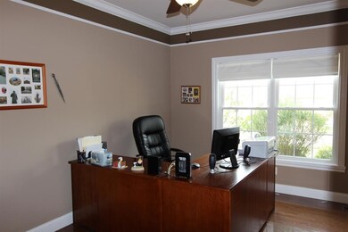 There is an office off the entry to the home.