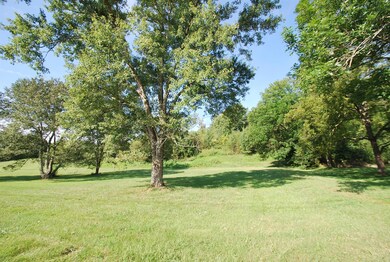 Look for orange flags to pull into existing driveway.  