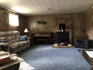 Spacious Family Room with Wood Burner for Extra He