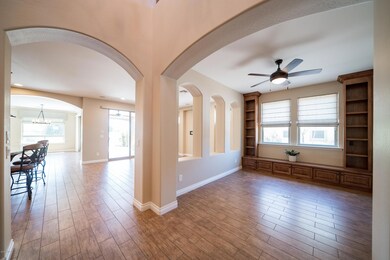 Elegant arches and built-in bookcases