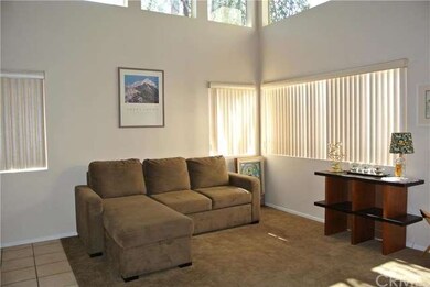 Formal living room with high ceilings