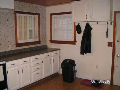 Updated kitchen with lots of work space.  Shutters