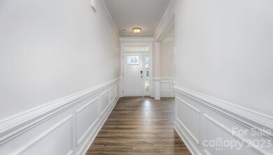 Foyer with crown and wainscoting