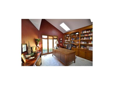 First floor study with wall of bookcases