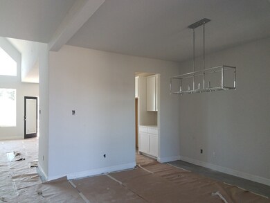 OPEN DINING ROOM WITH DIRECT ENTRY TO KITCHEN