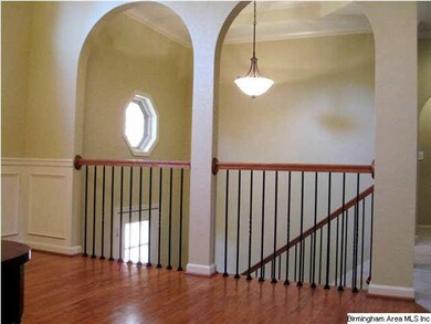 View of Foyer Through the Arches from the Dining R
