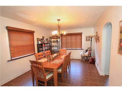Dining Room. The bright dining area has new tile f