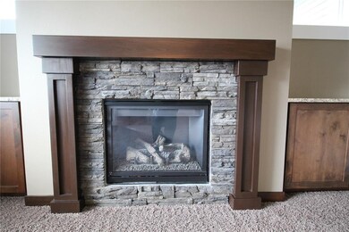 Main Level Gas Fireplace w/stacked stone