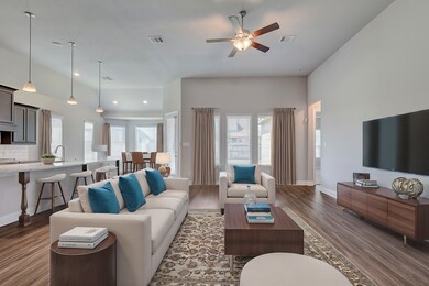 This modern open-concept living area features a sp