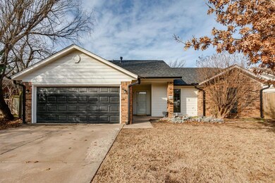 Ranch-style home featuring a garage