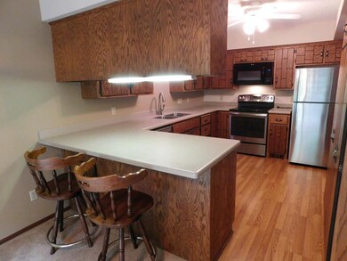 Breakfast bar with under-cabinet lighting.