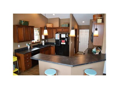 Kitchen. Kitchen with maple cabinets, hardwood flo