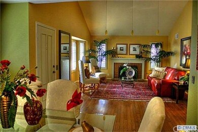Spacious living room offers high ceiling, new doub
