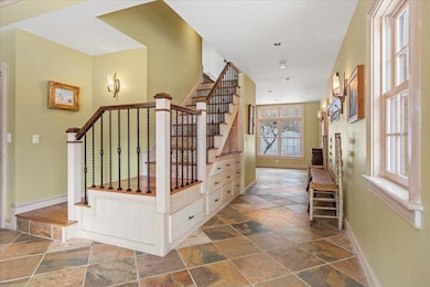 Entry foyer, stairs to bonus room