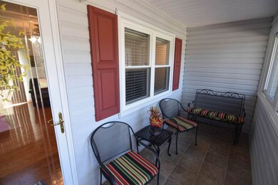 Comfortable front porch, enclosed for your conveni